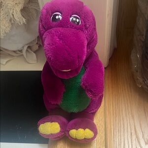 Vibrant Purple and Green Stuffed Dinosaur Toy